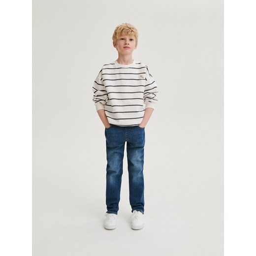 Reserved - Elastyczne jeansy regular - granatowy ze sklepu Reserved w kategorii Spodnie chłopięce - zdjęcie 170652786