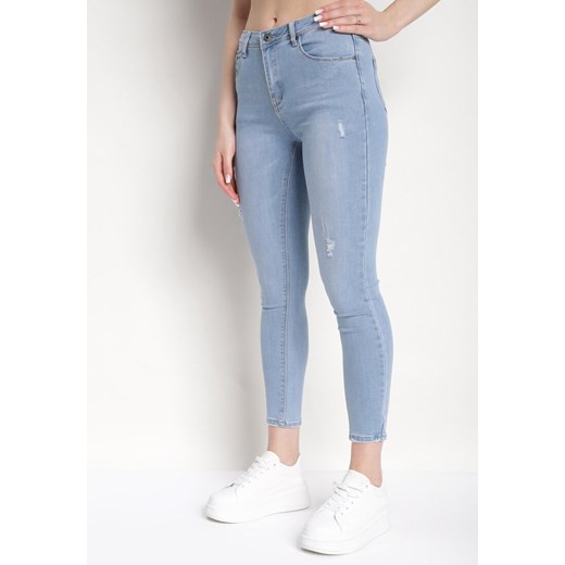 Jasnoniebieskie Jeansy o Fasonie Skinny z Minimalistycznymi Przedarciami Orivea ze sklepu Born2be Odzież w kategorii Jeansy damskie - zdjęcie 170735825