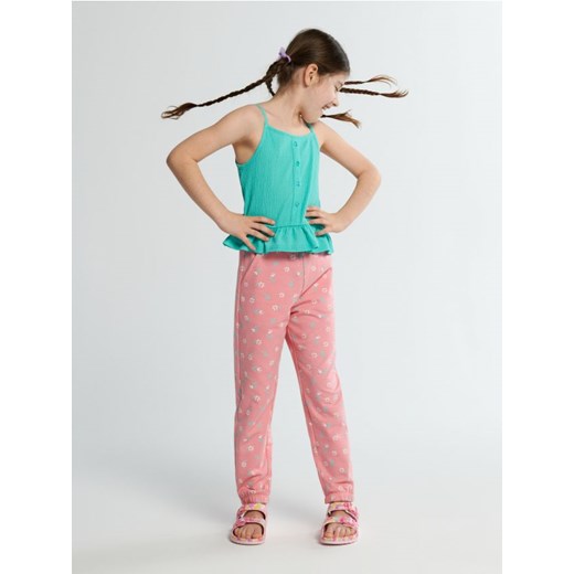 Sinsay - Spodnie dresowe - różowy ze sklepu Sinsay w kategorii Spodnie dziewczęce - zdjęcie 170757337