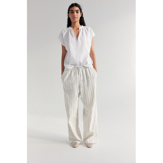 H & M - Spodnie z domieszką lnu - Beżowy ze sklepu H&M w kategorii Spodnie damskie - zdjęcie 170809879