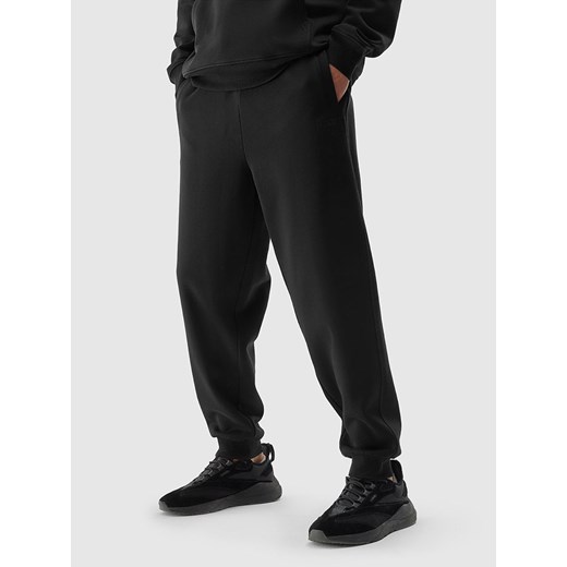 4F Spodnie dresowe w kolorze czarnym ze sklepu Limango Polska w kategorii Spodnie męskie - zdjęcie 170871417