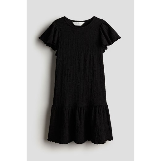 H & M - Dżersejowa sukienka z falbankowym rękawem - Czarny H & M 164 (12-14Y) H&M
