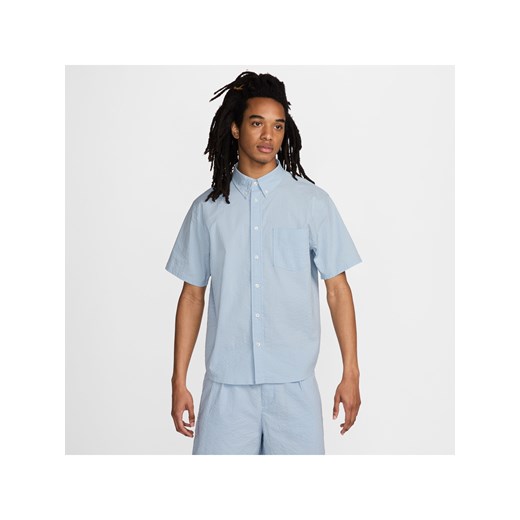 Męska koszula z krótkim rękawem z karbowanej tkaniny zapinana na guziki Nike Life - Niebieski ze sklepu Nike poland w kategorii Koszule męskie - zdjęcie 170914008