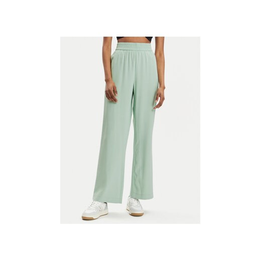 Vero Moda Spodnie materiałowe Carmen 10278926 Zielony Wide Leg ze sklepu MODIVO w kategorii Spodnie damskie - zdjęcie 170918179