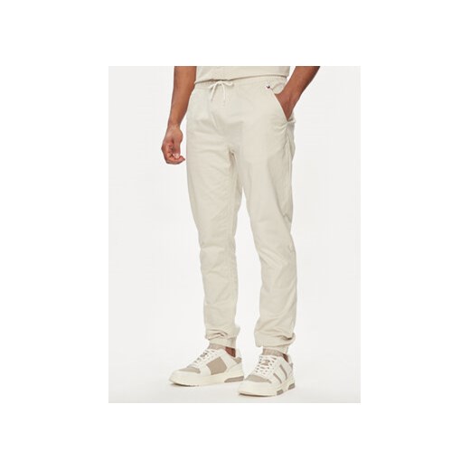 Tommy Jeans Joggery Austin DM0DM19457 Beżowy Regular Fit Tommy Jeans M MODIVO