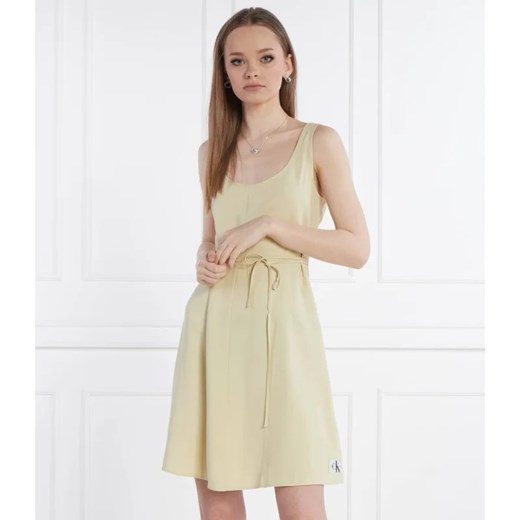 Sukienka Calvin Klein mini beżowa rozkloszowana na ramiączkach 