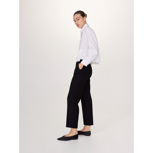 Reserved - Spodnie z asymetrycznym zapięciem - czarny ze sklepu Reserved w kategorii Spodnie damskie - zdjęcie 170925557
