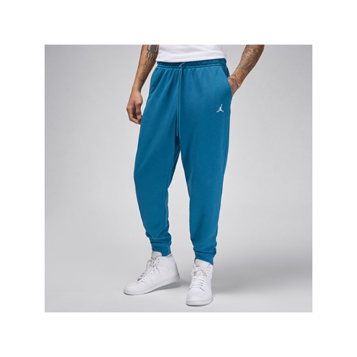 Męskie spodnie z dzianiny pętelkowej Jordan Essentials - Niebieski ze sklepu Nike poland w kategorii Spodnie męskie - zdjęcie 170955389