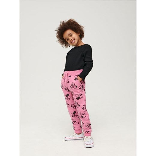 Sinsay - Spodnie dresowe Myszka Minnie - różowy ze sklepu Sinsay w kategorii Spodnie dziewczęce - zdjęcie 170977776