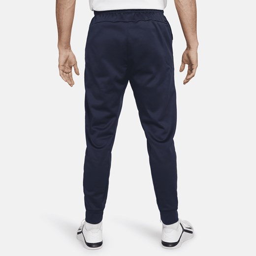 Męskie zwężane spodnie do fitnessu Therma-FIT Nike Therma - Niebieski Nike L Nike poland
