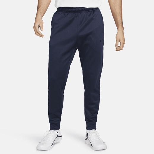 Męskie zwężane spodnie do fitnessu Therma-FIT Nike Therma - Niebieski Nike L Nike poland