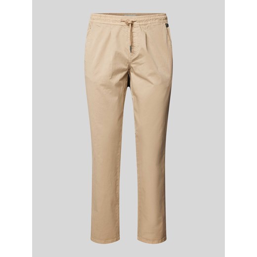 Spodnie z zakładkami w pasie o kroju regular fit z elastycznym pasem ze sklepu Peek&Cloppenburg  w kategorii Spodnie męskie - zdjęcie 171002017