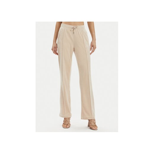 Juicy Couture Spodnie dresowe Tina JCAPW045 Beżowy Regular Fit ze sklepu MODIVO w kategorii Spodnie damskie - zdjęcie 171039338