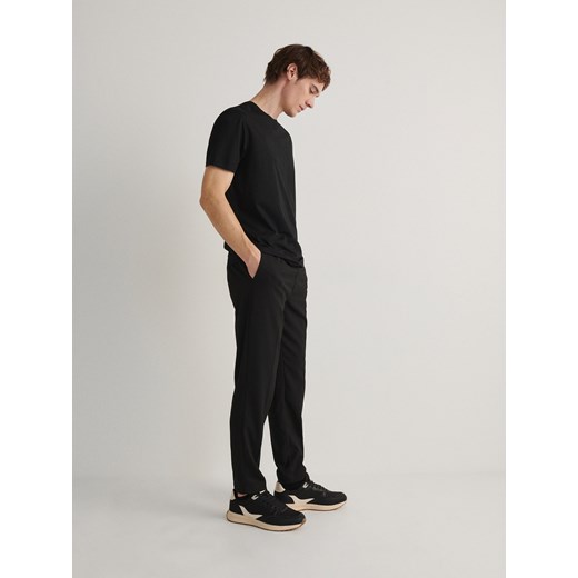 Reserved - Spodnie jogger slim - czarny ze sklepu Reserved w kategorii Spodnie męskie - zdjęcie 171188445