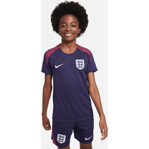 Dzianinowa koszulka piłkarska z krótkim rękawem dla dużych dzieci Nike Dri-FIT Anglia Strike - Fiolet ze sklepu Nike poland w kategorii T-shirty chłopięce - zdjęcie 171206717