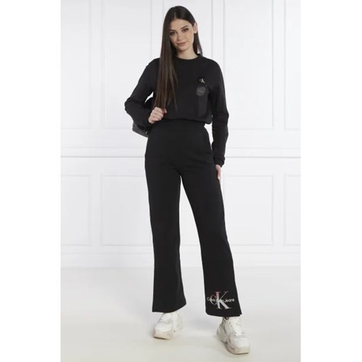 Czarne spodnie damskie Calvin Klein na wiosnę 