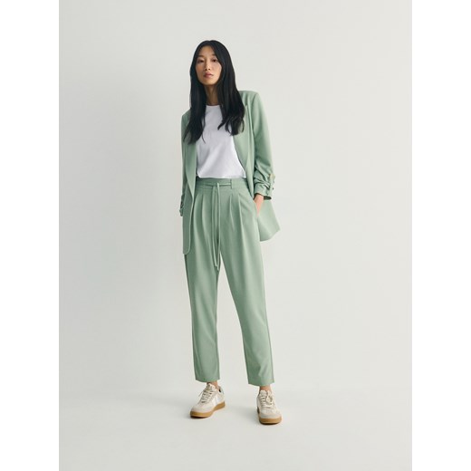 Reserved - Gładkie spodnie z wiązaniem - jasnozielony ze sklepu Reserved w kategorii Spodnie damskie - zdjęcie 171217266