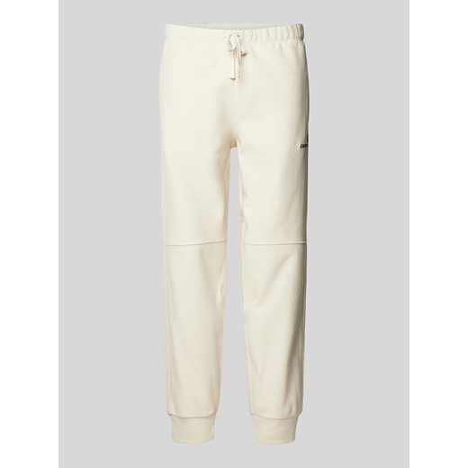 Spodnie dresowe z wpuszczanymi kieszeniami model ‘AMERICAN’ ze sklepu Peek&Cloppenburg  w kategorii Spodnie męskie - zdjęcie 171223597
