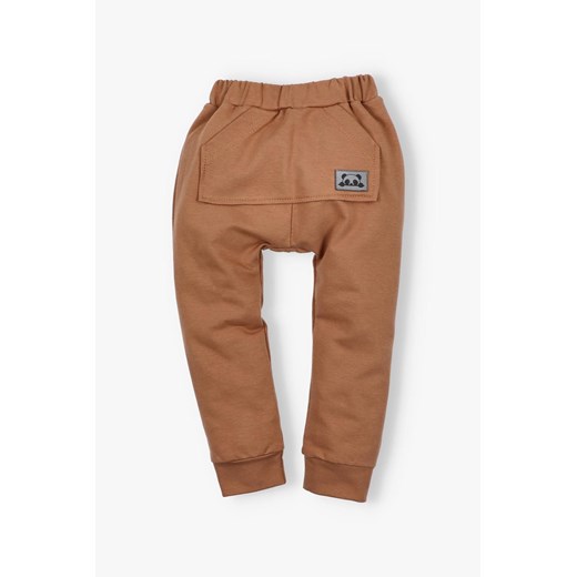Spodnie chłopięce baggy brązowe ze sklepu 5.10.15 w kategorii Spodnie chłopięce - zdjęcie 171260729
