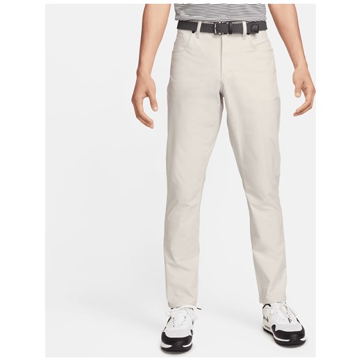 Męskie spodnie do golfa o dopasowanym kroju z pięcioma kieszeniami Nike Tour - Szary ze sklepu Nike poland w kategorii Spodnie męskie - zdjęcie 171286045