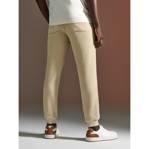 Sinsay - Spodnie dresowe - kremowy Sinsay S Sinsay