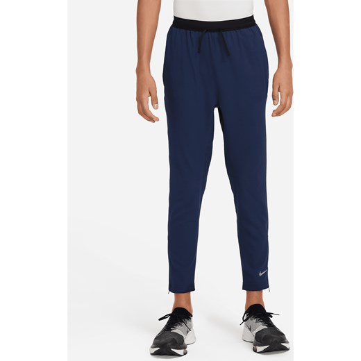 Spodnie treningowe dla dużych dzieci (chłopców) Dri-FIT Nike Multi Tech EasyOn - Niebieski ze sklepu Nike poland w kategorii Spodnie męskie - zdjęcie 171331565