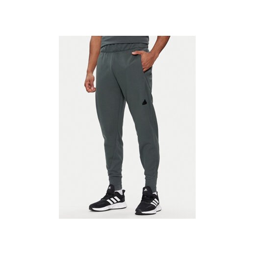 adidas Spodnie dresowe Z.N.E. Winterized IR5244 Zielony Regular Fit ze sklepu MODIVO w kategorii Spodnie męskie - zdjęcie 171345257