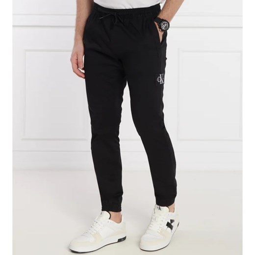 CALVIN KLEIN JEANS Spodnie jogger MONOLOGO | Skinny fit ze sklepu Gomez Fashion Store w kategorii Spodnie męskie - zdjęcie 171359905