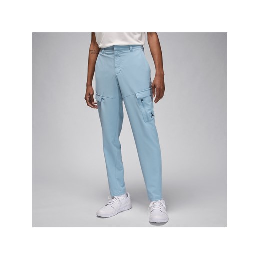 Męskie spodnie do golfa Jordan - Niebieski ze sklepu Nike poland w kategorii Spodnie męskie - zdjęcie 171364827