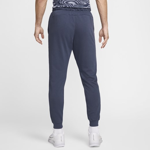 Spodnie męskie niebieskie Nike w sportowym stylu 