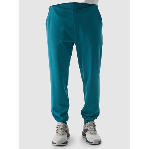4F Spodnie dresowe w kolorze turkusowym ze sklepu Limango Polska w kategorii Spodnie męskie - zdjęcie 171432719
