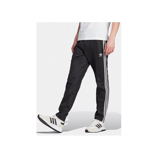 adidas Spodnie dresowe adicolor Classics Beckenbauer II5764 Czarny Slim Fit ze sklepu MODIVO w kategorii Spodnie męskie - zdjęcie 171442309