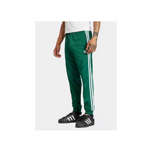 adidas Spodnie dresowe adicolor Classics SST IR9886 Zielony Slim Fit L MODIVO