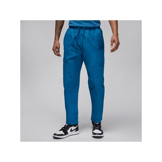 Męskie spodnie z tkaniny Jordan Essentials - Niebieski ze sklepu Nike poland w kategorii Spodnie męskie - zdjęcie 171447567