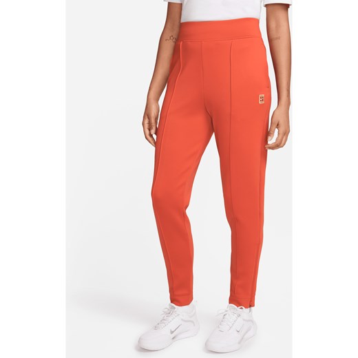 Damskie spodnie z dzianiny do tenisa NikeCourt Dri-FIT - Pomarańczowy ze sklepu Nike poland w kategorii Spodnie damskie - zdjęcie 171447577