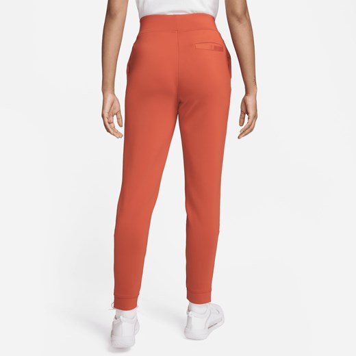 Damskie spodnie z dzianiny do tenisa NikeCourt Dri-FIT - Pomarańczowy Nike XS (EU 32-34) Nike poland