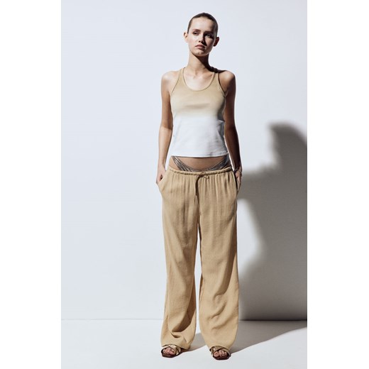 H & M - Krepowane spodnie bez zapięcia - Beżowy ze sklepu H&M w kategorii Spodnie damskie - zdjęcie 171537577