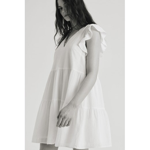 H & M - Sukienka z falbankowym rękawem - Biały H & M L H&M