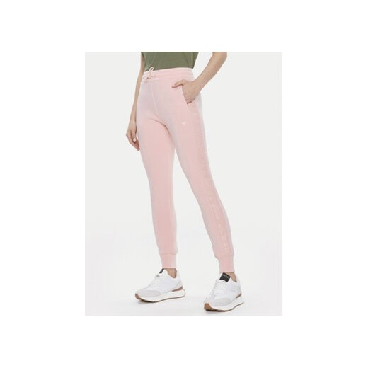 Guess Spodnie dresowe V2YB18 K7UW2 Różowy Regular Fit ze sklepu MODIVO w kategorii Spodnie damskie - zdjęcie 171586898