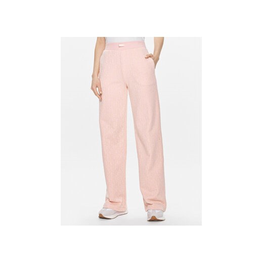 Guess Spodnie dresowe Logo V4RB13 KC2W0 Różowy Relaxed Fit ze sklepu MODIVO w kategorii Spodnie damskie - zdjęcie 171586929