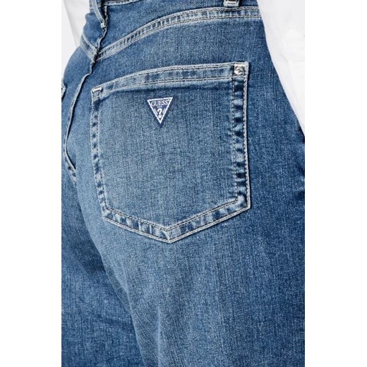 Granatowe jeansy damskie Guess casual 