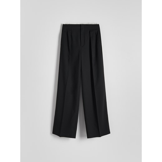 Reserved - Spodnie z surowym wykończeniem - czarny ze sklepu Reserved w kategorii Spodnie damskie - zdjęcie 171596897