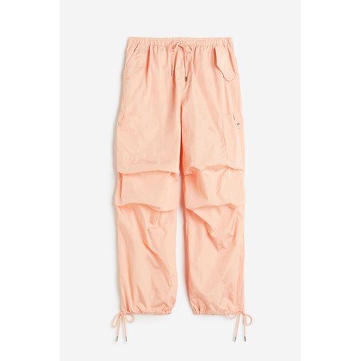H & M - Nylonowe spodnie spadochronowe - Pomarańczowy ze sklepu H&M w kategorii Spodnie damskie - zdjęcie 171703707