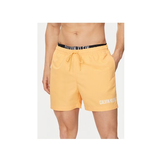 Calvin Klein Swimwear Szorty kąpielowe KM0KM00992 Pomarańczowy Regular Fit ze sklepu MODIVO w kategorii Kąpielówki - zdjęcie 171704626
