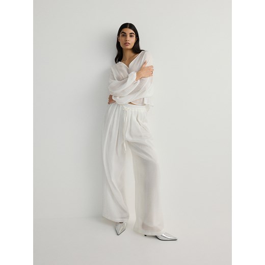 Reserved - Spodnie z lyocellem - biały ze sklepu Reserved w kategorii Spodnie damskie - zdjęcie 172001708