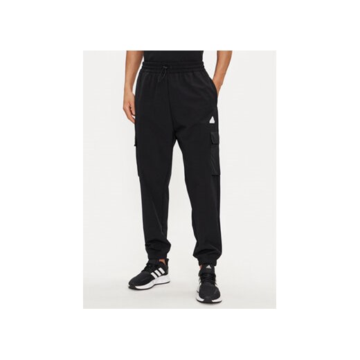 adidas Spodnie dresowe City Escape IR5179 Czarny Regular Fit ze sklepu MODIVO w kategorii Spodnie męskie - zdjęcie 172020375