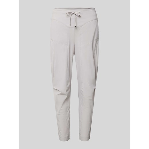 Spodnie materiałowe o kroju tapered fit z tunelem model ‘GIRA’ ze sklepu Peek&Cloppenburg  w kategorii Spodnie damskie - zdjęcie 172024406