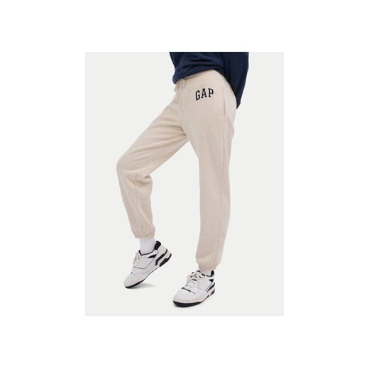 Gap Spodnie dresowe 463492-12 Beżowy Regular Fit ze sklepu MODIVO w kategorii Spodnie damskie - zdjęcie 172060586