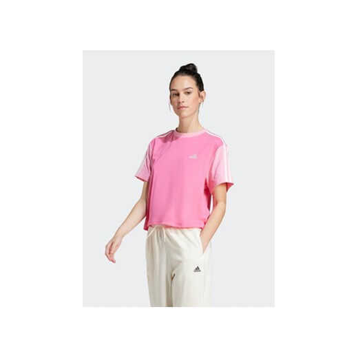 adidas T-Shirt Essentials 3-Stripes IS1574 Różowy Loose Fit ze sklepu MODIVO w kategorii Bluzki damskie - zdjęcie 172104509