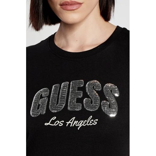 Bluzka damska Guess z bawełny z krótkimi rękawami w stylu młodzieżowym 